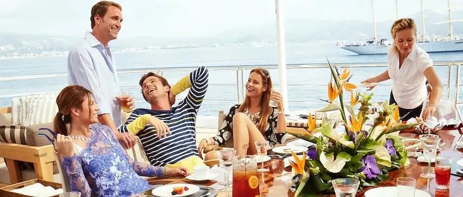 Noblesse Yachts People gathering for brunch at a corporate yacht event